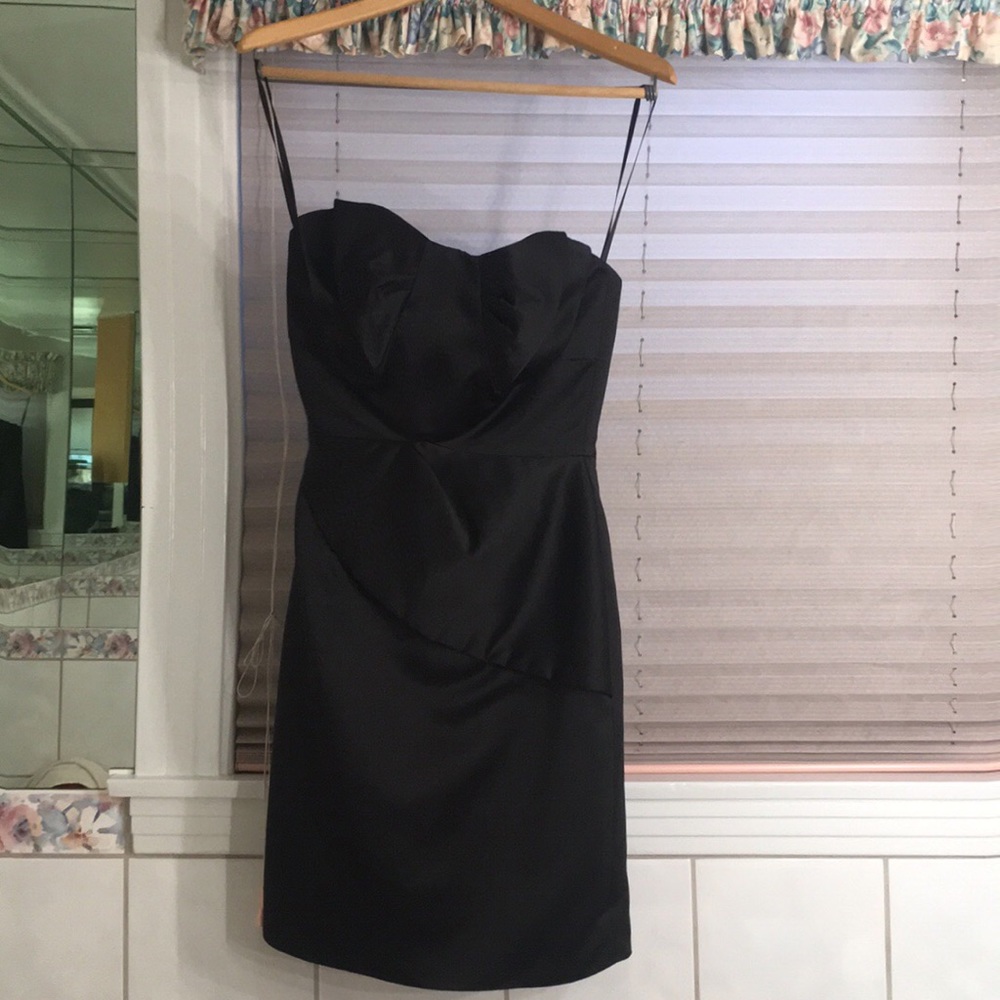 1980s sleek black cocktail dress